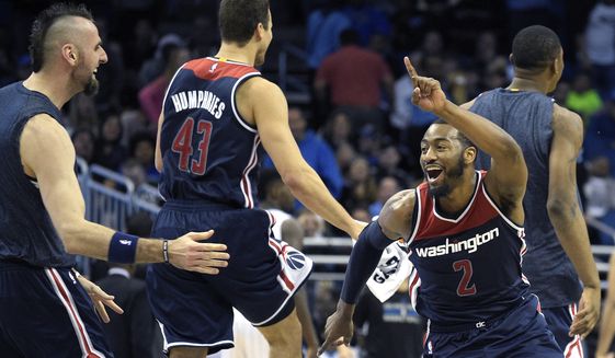 wizards-magic-basketballjpeg-0ecc2_c0-127-3064-1912_s561x327