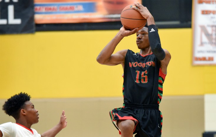 WALDORF, MD - December 19: H.D. Woodson's Antwan Walker (15) puts up a running jump shot in the first half. H.D. Woodson defeats St. Stephen's/St. Agnes, 56-52 in the DMV Tip-Off Classic Saturday, December 19, 2015 at North Point High School in Waldorf, Maryland. (Photo by Doug Kapustin/For The Washington Post)